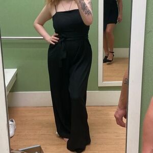 A black jump suit /cute black heels